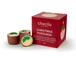 Christmas chocolate puddings with a Christmas leaves design from Chocilo a Melbourne based company in Australia included in the hamper of curated with conscience