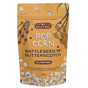 Gourmet popcorn flavored with native wattleseed and butterscotch from My Dilly Bag included in the hamper by curated with conscience