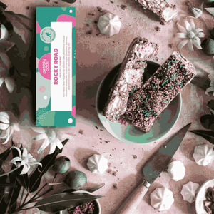 Pavlova-inspired rocky road with passionfruit chocolate, berries and pistachio, handmade in Mudgee included in the hamper of curated with conscience