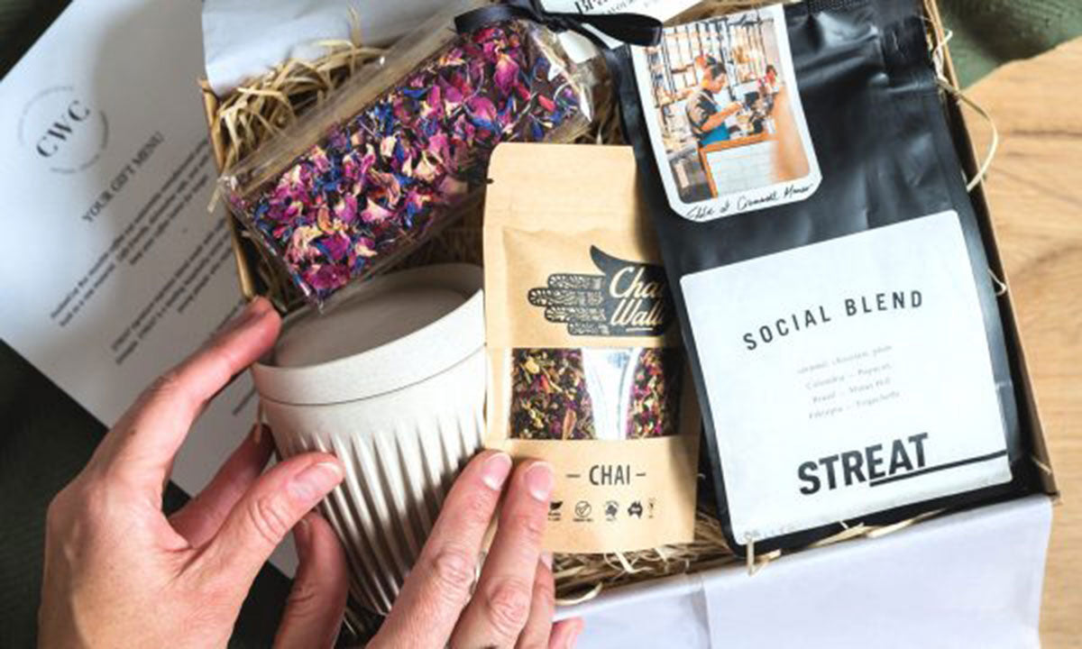 Graze Hamper featuring ethical products like SisterWorks fig jam and social enterprise-made dukkah – gifts that give back and boost happiness.