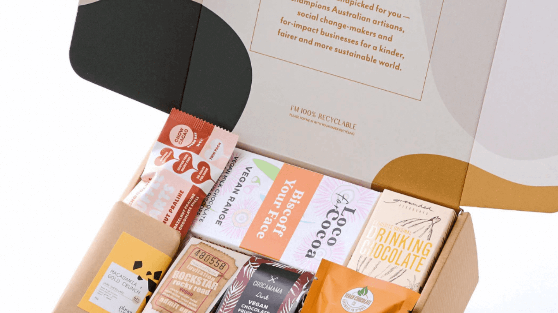 vegan gourmet hamper from Curated with Conscience featuring artisan chocolate, cookies, drinking chocolate, and snacks in eco-friendly packaging, perfect gift hampers available in melbourne and across australia
