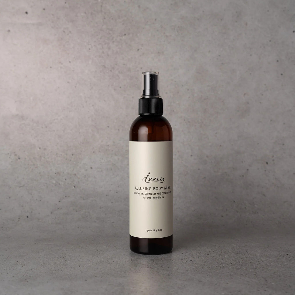denu Alluring Body Mist with rosemary, geranium, cedarwood, orange and lemon essential oils.