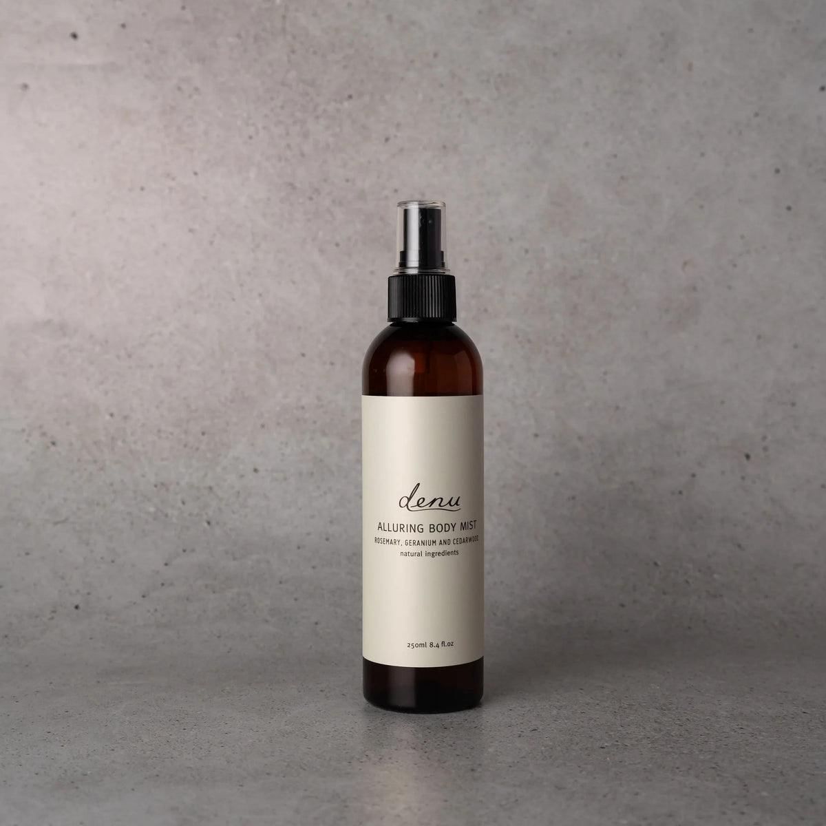 denu Alluring Body Mist with rosemary, geranium, cedarwood, orange and lemon essential oils.