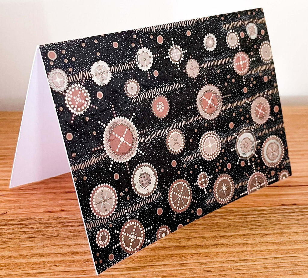 comes with an aboriginal design gift card from Petite Paper Co