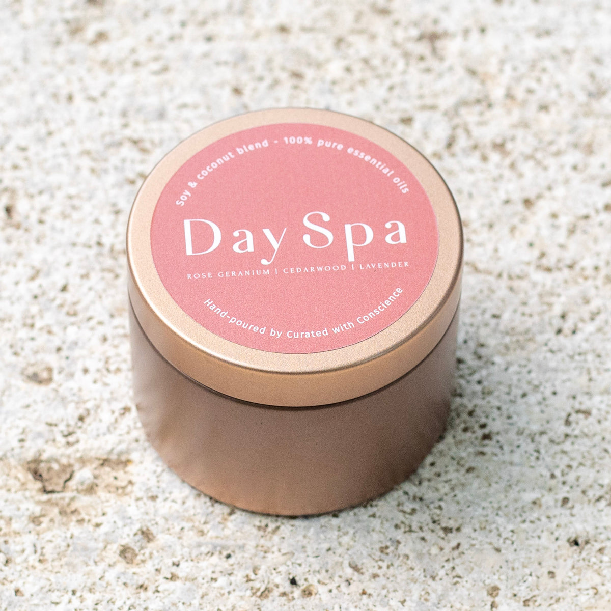 Day Spa natural soy candle, hand-poured in small batches with essential oils of rose geranium, cedarwood, and lavender.