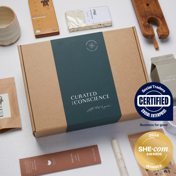 mobile image curated with conscience hamper packaging with componants in the hamper such as wine, chocolates and australian gifts for coporate gifting, housewarmings and christmas hampers