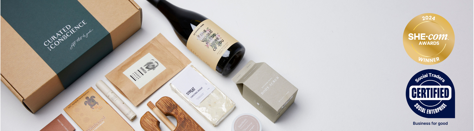 Curated with conscience hampers and contents showing wine bottle and gifts for hampers for corporate, christmas hampers and housewarming gifts