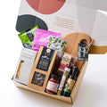 Graze hamper with gourmet Australian-made snacks, preserves, olives, nuts, and a handcrafted grazing board. Perfect for foodies and housewarming gifts.