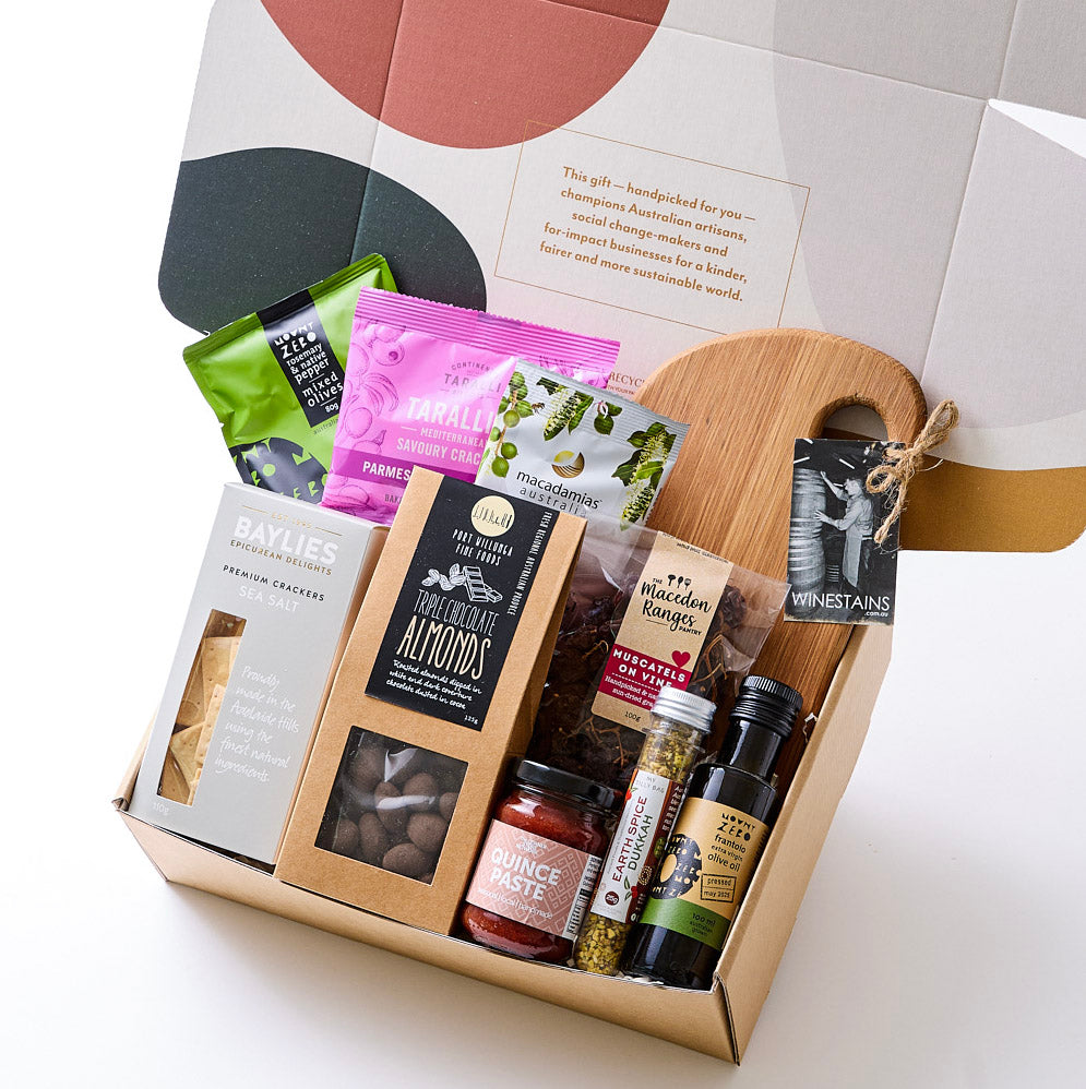 Graze hamper with gourmet Australian-made snacks, preserves, olives, nuts, and a handcrafted grazing board. Perfect for foodies and housewarming gifts.