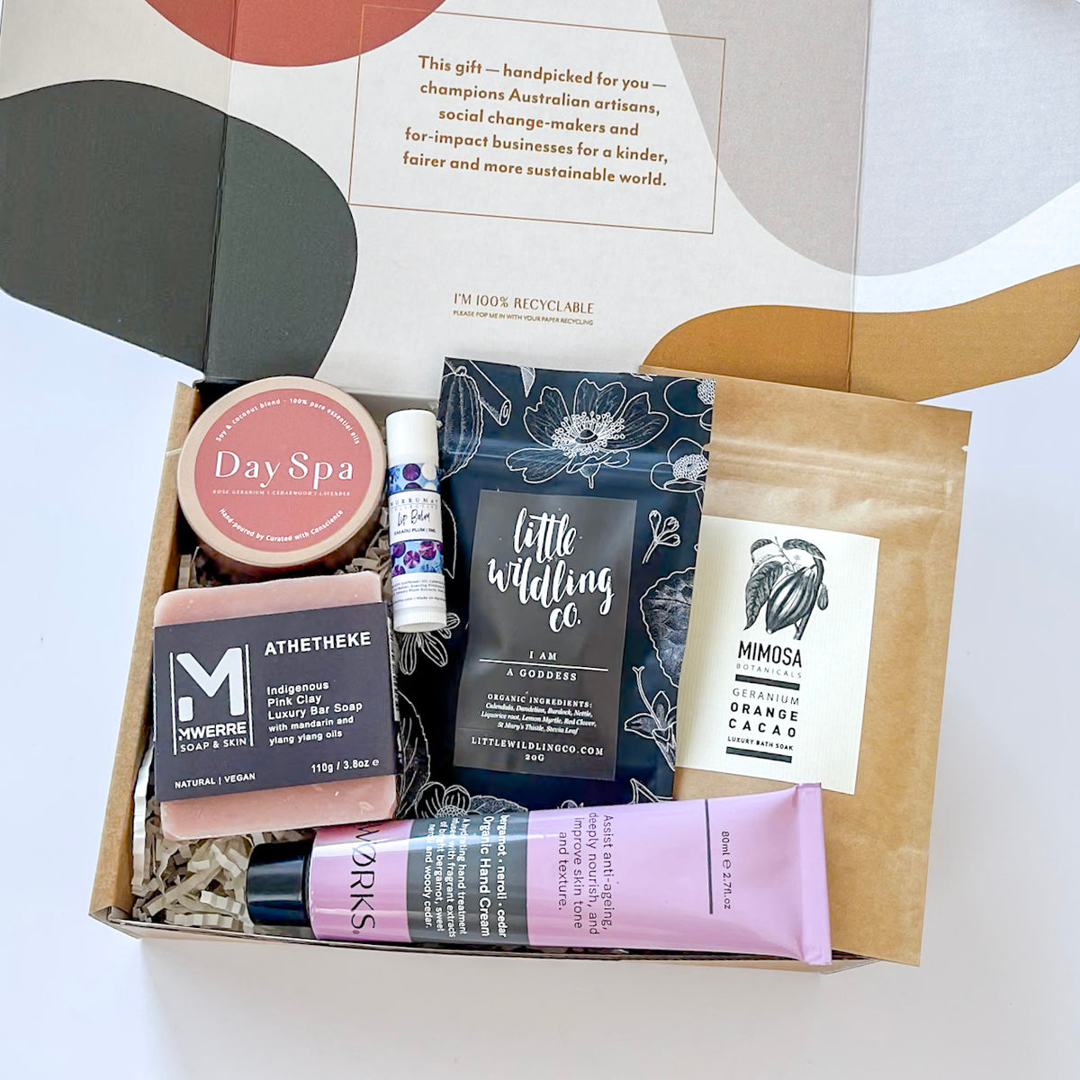 Gift Hamper for women with products such as organic hand cream, lip balm, hand cream, soy candle, bath soak and clay soap and an organic tea which promotes womens heath in a beautiful box perfect as a gift