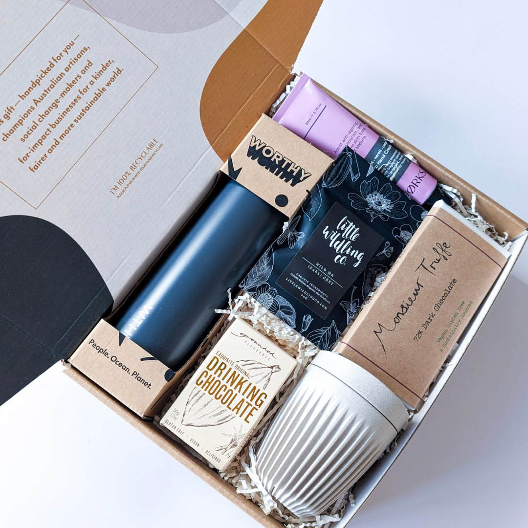 A perfect welcome or staff recognition hamper. with sustainable water bottle, Huskee Cup, artisan chocolate, tea bags, drinking chocolate, and luxurious hand cream 