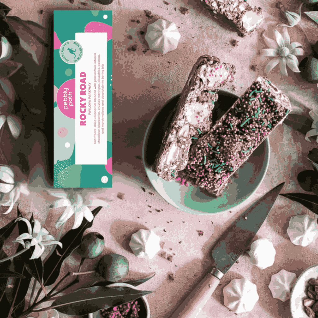 Pavlova-inspired rocky road with passionfruit chocolate, berries and pistachio, handmade in Mudgee included in the hamper of curated with conscience