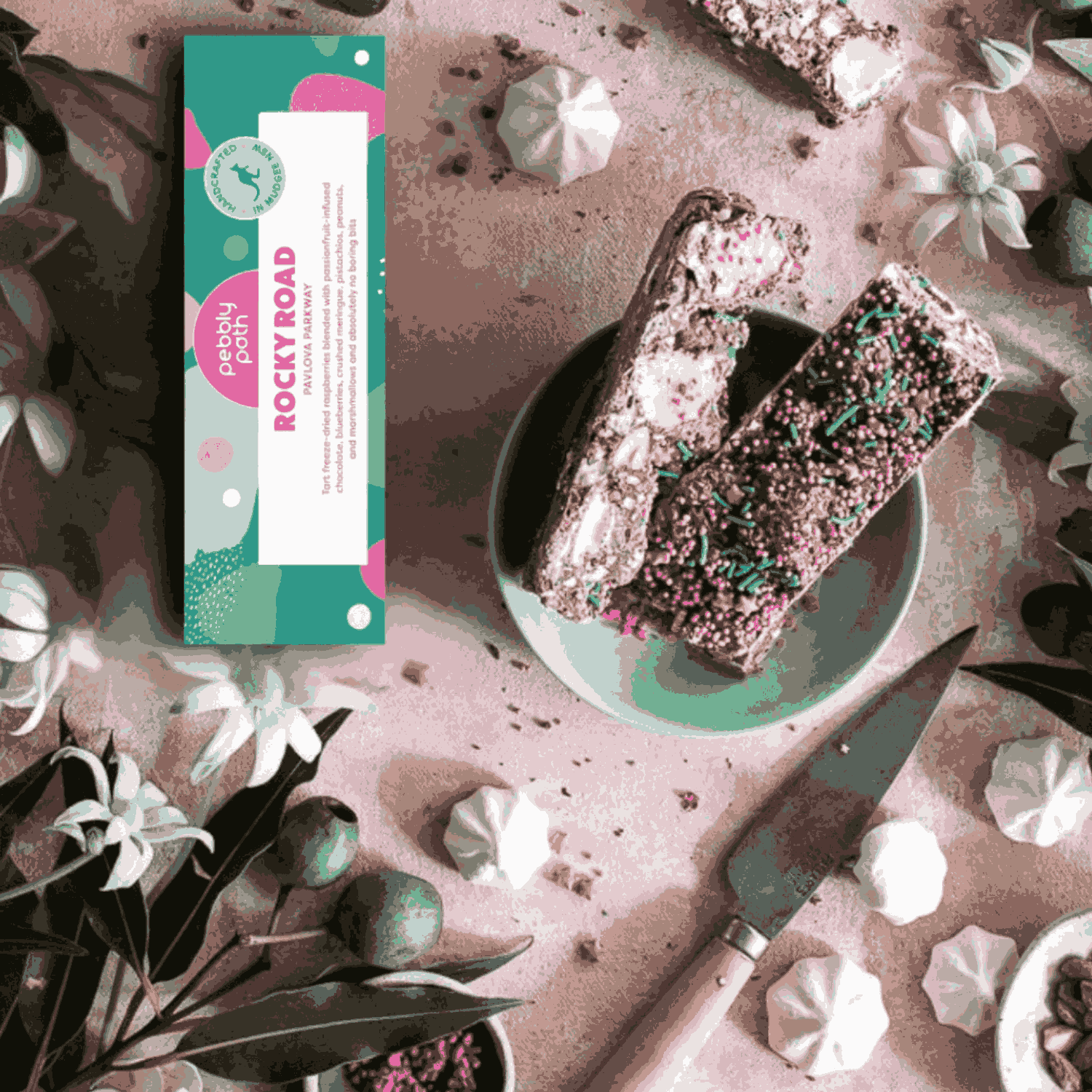 Pavlova-inspired rocky road with passionfruit chocolate, berries and pistachio, handmade in Mudgee included in the hamper of curated with conscience