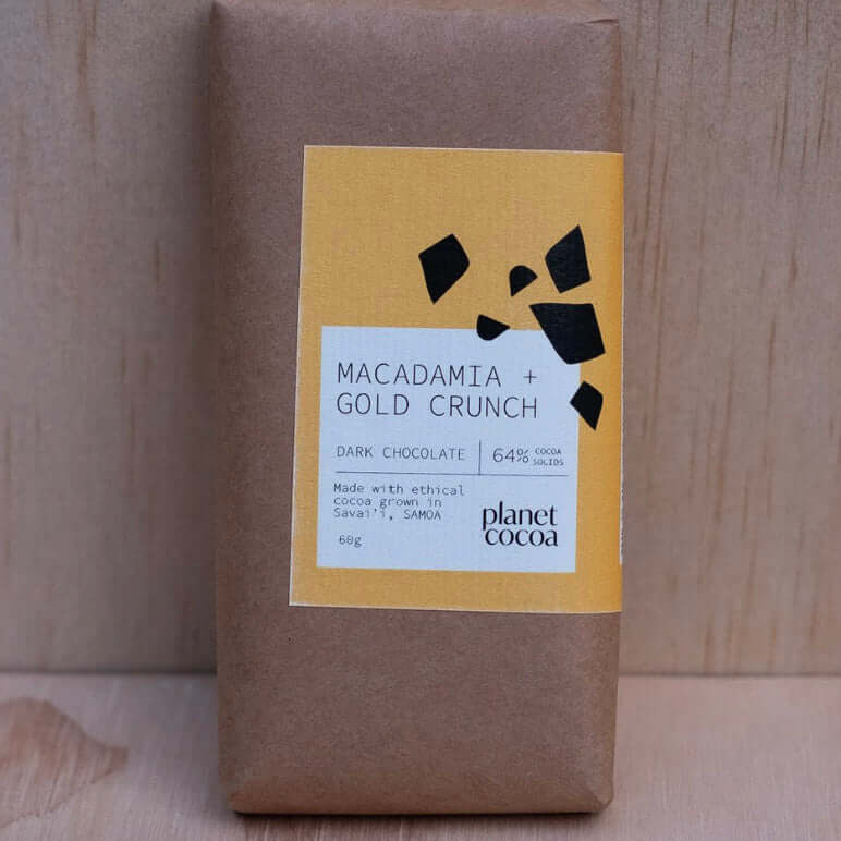 Dark chocolate bar from Planet Cocoa made with ethically sourced Samoan cocoa beans, roasted Australian macadamias, and housemade vegan honeycomb gold crunch