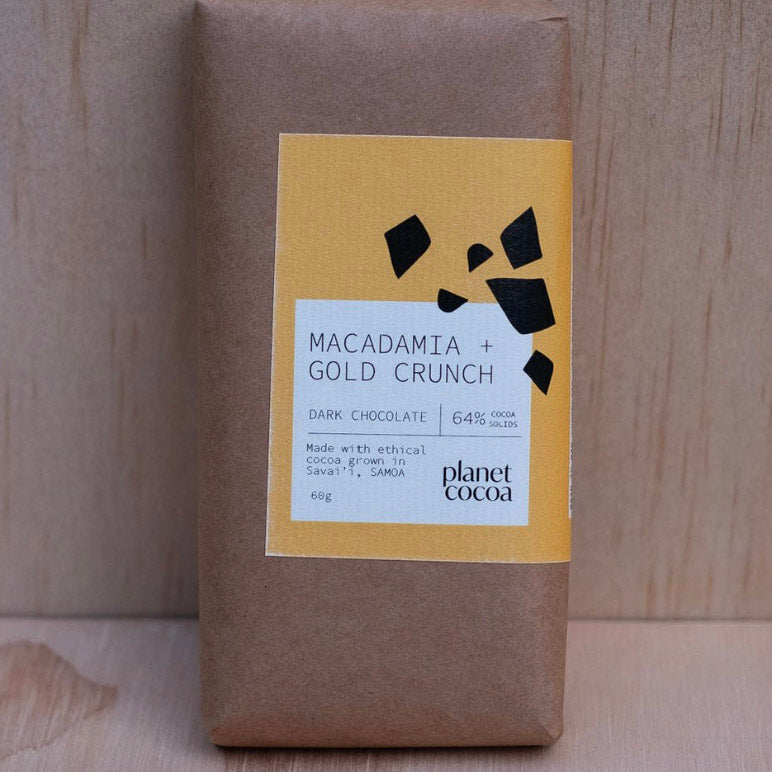 Dark chocolate bar from Planet Cocoa made with ethically sourced Samoan cocoa beans, roasted Australian macadamias, and housemade vegan honeycomb gold crunch