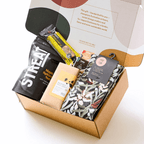 Men’s gift bundle with recycled green socks, maple spiced nut medley, vegan chocolates, indigenous prebiotic bar, and native ingredient chocolate bites