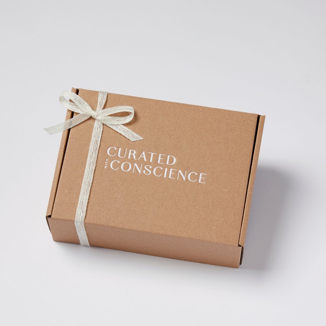Front view of the Curated With Conscience hamper featuring eco-friendly packaging