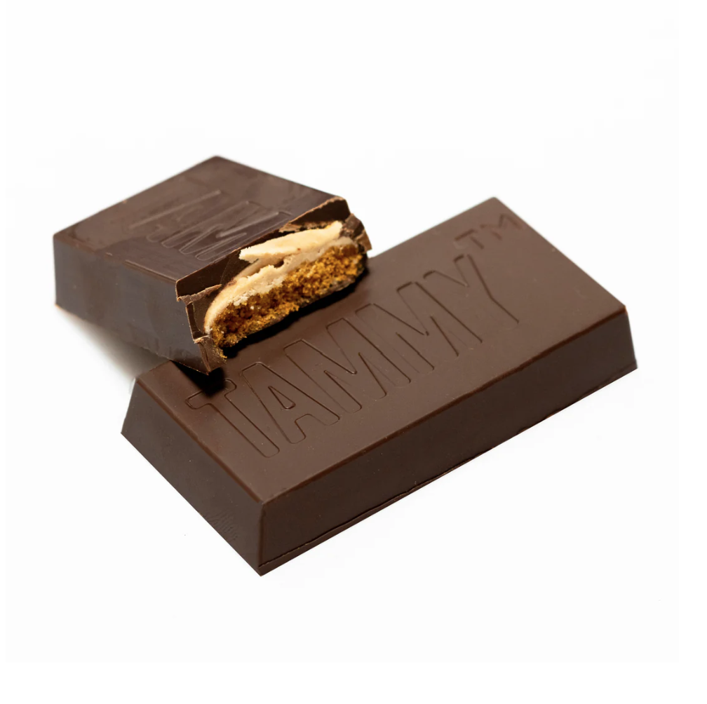 Vegan chocolate-coated cinnamon biscuits with hazelnut filling, a plant-based take on a classic Aussie treat by Vegan Chocolate Co