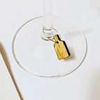 Handcrafted recycled wine barrel charm by Winestains, a father-daughter team in Barossa Valley, to identify wine glasses